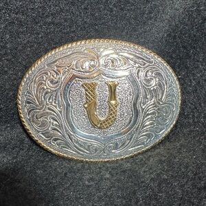 Silver and Gold Western Belt Buckle with the initial “U”